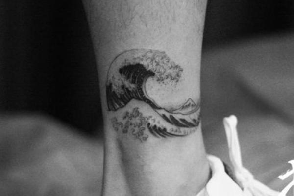 大溪水命纹身:赋予生命的水之纹理与象征 大溪水命纹身:赋予生命的水之纹理与象征